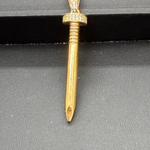 Dije de Clavo en Oro 10K